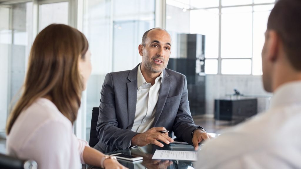 Trusted Canadian advisor helping client choose the best term insurance policy