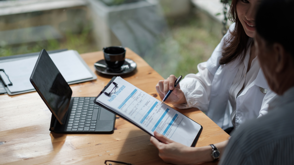 Doctor talking to a patient about no medical exam life insurance