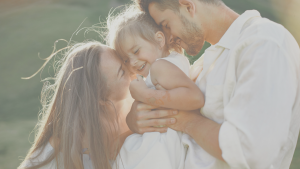 Mother, father, and baby representing peace of mind with simplified life insurance Canada